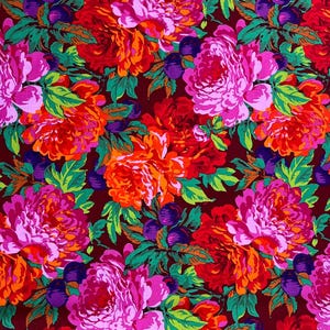 May include: A fabric featuring a bold floral design. It showcases large peony blooms in red, orange, and pink, complemented by green foliage and purple berries, set against a dark burgundy backdrop. The pattern is rich and colourful.