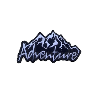 May include: Black embroidered patch with white mountain range and the word "Adventure" in a white cursive font.