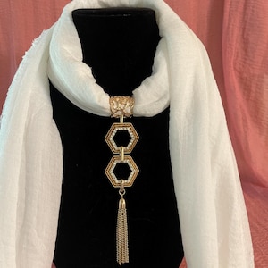 Gold tone double hexagon pendant with tassel and scarf slide