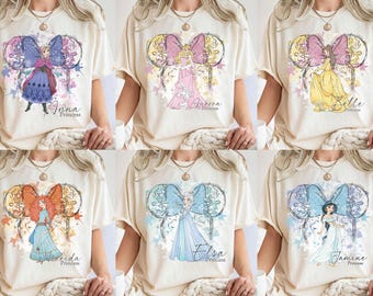 Maglietta con fiocco Coquette acquerello retrò Disney Princess, maglietta vintage Cenerentola Biancaneve Ariel Belle Rapunzel, maglietta Girl Disney Trip 2025