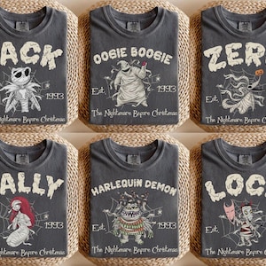 May include: Six charcoal grey t-shirts featuring characters from The Nightmare Before Christmas. Each shirt displays a character name, a graphic of the character, the text Est. 1993, and the title The Nightmare Before Christmas in white.