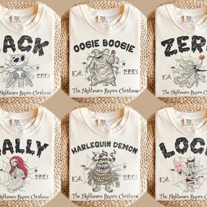 May include: Six off-white t-shirts featuring characters from The Nightmare Before Christmas. Each shirt displays a character name, the text Est. 1993, and The Nightmare Before Christmas, with illustrations of Jack, Oogie Boogie, Zero, Sally, Harlequin Demon, and Lock.