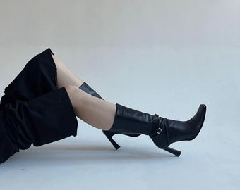 bottes noires vintage en cuir véritable