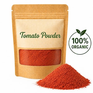 May include: A brown paper bag of tomato powder with a clear window, and a pile of red powder. The bag has the words "Tomato Powder" printed on it, and a green "100% Organic" seal.