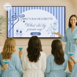 May include: A group of women in blue robes holding blue cocktails, gathered around a television screen. The screen displays the text "Emily's Bachelorette" and "What did the groom say?" with a start button. The scene suggests a bachelorette party game.