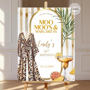 May include: A party sign with the text "MOO MOO'S & MARGARITAS" and "Emily's 30th Birthday". It features a leopard print jumpsuit, a margarita, and citrus fruit. The background has gold stripes and tropical leaves.