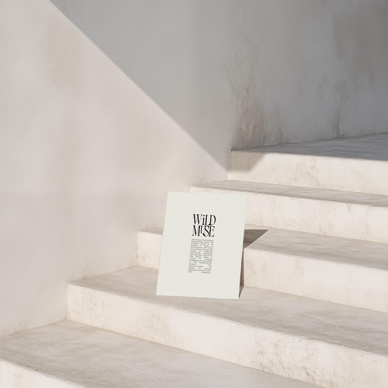 May include: A white poster with black text that reads "WILD MUSE" on a white staircase. The text is a definition of the word "muse".