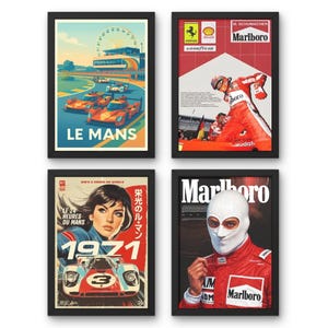 May include: Four framed racing posters. The top left poster says "LE MANS" and features race cars. The top right poster features a race car driver in a red suit with "Marlboro" branding. The bottom left poster says "1971" and features a woman and a race car. The bottom right poster features a race car driver in a white mask and red suit with "Marlboro" branding.