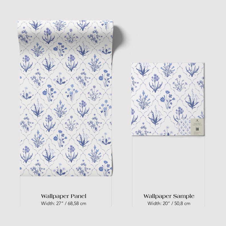 May include: A roll of wallpaper and a sample, both featuring a repeating pattern of blue floral designs on a white background. The wallpaper panel is 27 inches wide, and the sample is 20 inches wide. The design includes various flower and leaf motifs.