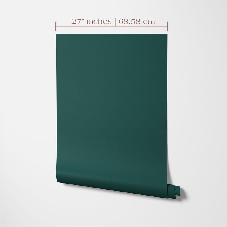 Wallpaper roll 27 inches wide of a solid color wallpaper in dark green.