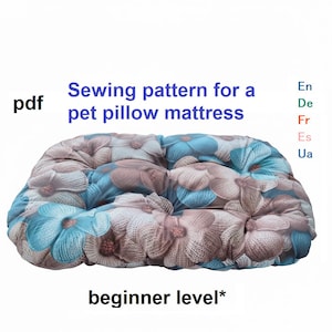 May include: A floral pet pillow mattress with a blue and brown flower pattern. The image includes the text "Sewing pattern for a pet pillow mattress" and "beginner level*". The pattern is available as a PDF.