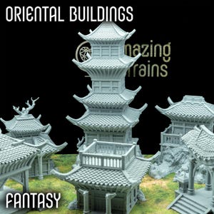 May include: A collection of gray miniature Oriental buildings with multiple tiers and curved roofs. The buildings are set on a green and brown surface, with the word "FANTASY" at the bottom and "ORIENTAL BUILDINGS" at the top.