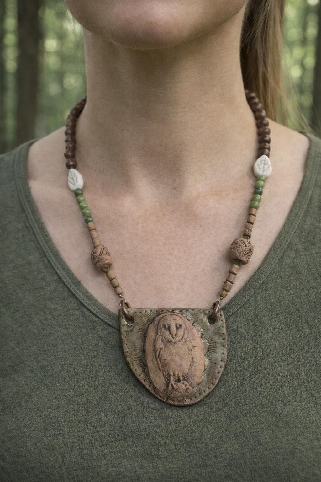 Ceramic owl and crystal necklace.
