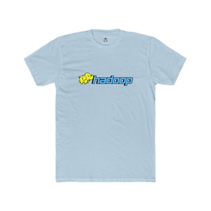 May include: Pale blue t-shirt with the word "hadoop" in a blue and black font, and a yellow elephant graphic. The shirt has a crew neck and short sleeves.