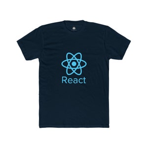 May include: A navy blue t-shirt with a light blue atom symbol and the word "React" beneath it. The design is centrally placed. The t-shirt has a crew neck and short sleeves, suitable for everyday wear. The design is in a light blue colour.