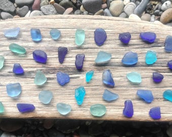 50+ Micro pieces of Blue Sea Glass in various shades and sizes all tiny.