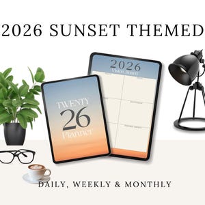 May include: A 2026 Sunset Themed planner with a vision board, a black desk lamp, a potted plant, eyeglasses, and a cup of coffee. The planner has a sunset gradient design and the text "Twenty 26 Planner". The text "Daily, Weekly & Monthly" is also visible.