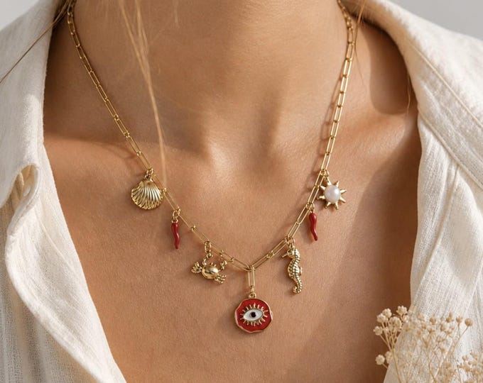 Gold-tone seahorse shell charm necklace with protective eye – Mediterranean style summer jewelry – Trendy gift for women