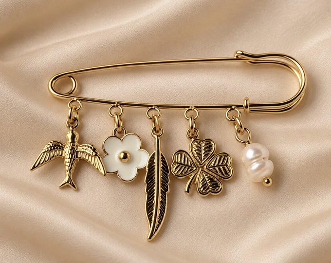 Gold-tone pin brooch with charms: bird, flower, feather and clover, boho chic costume jewelry, lucky charm accessory
