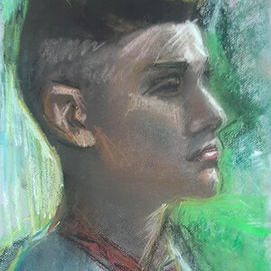 Portrait of a young man in spring