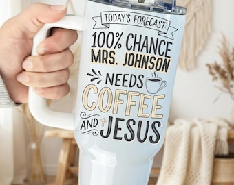 May include: A white insulated tumbler with a handle and a clear lid featuring a metal straw. The text reads: TODAY'S FORECAST: 100% CHANCE MRS. JOHNSON NEEDS COFFEE AND JESUS, accompanied by a small coffee cup icon and a cross symbol in black and tan.