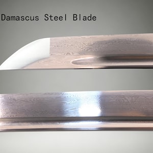 May include: A Damascus steel blade featuring a distinct wavy, layered metal pattern across the surface. The blade includes a prominent groove running along the length and a sharp, polished tip. The text Damascus Steel Blade is visible.