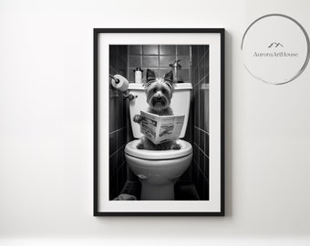 May include: Black and white photograph of a small dog sitting on a toilet and reading a newspaper.