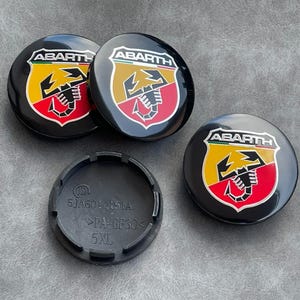 56mm Tapacubos Centro de Ruedas Llantas Abarth Accesorio para Coche Fiat 500