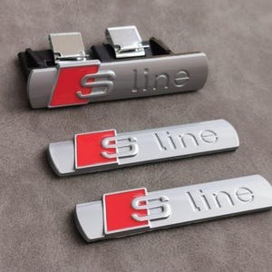 Sline Emblema de Calandra mas 2 Logos Laterales Color Gris Accesorios para Coches Tuning