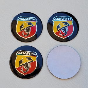 56mm Emblemas Tapacubos Centro de Ruedas Llantas Abarth Accesorio para Coche Fiat 500