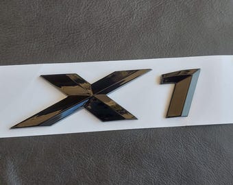 BMW X1 Bagagerumsemblem: Glanssvart, E84 F48 F49 U11