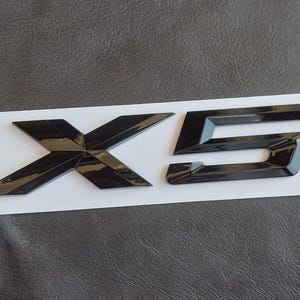 Emblema del maletero del BMW X5: Insignia trasera negra brillante (E53 E70 F15 G05)