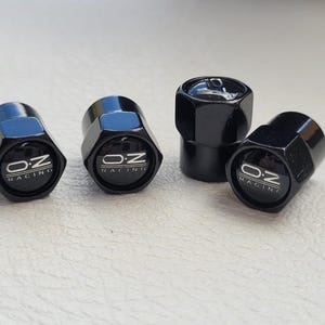 OZ Racing 4 Tapones de Neumaticos para Llantas Ruedas Accesorio para Coches Tuning Color Negro