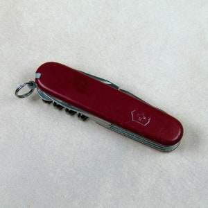 Canivete multiferramenta Victorinox Officier Suisse, rebites seguros, comprimento de 3,54 pol. a 6,30 pol.