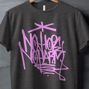 Urban Streetwear Graffiti Design T-Shirt, Bold Pink Graffiti Art Tee, Edgy Street Style Apparel, Trendy Graphic T-Shirt, Casual Wear