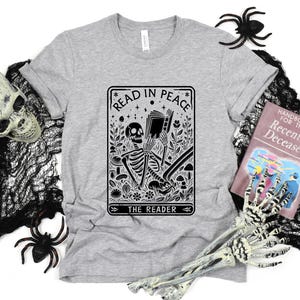 Read in Peace Shirt, Skeleton Halloween T-Shirt, Book Lover Shirt, Skeleton Reading Shirt, Spooky Season Sweatshirt, Halloween Bookish Gift