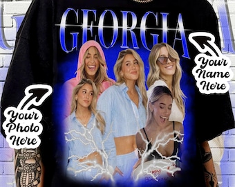 May include: A black t-shirt with a blue and white graphic print of five women. The graphic includes the word "GEORGIA" in a blue and white font. The graphic also includes lightning bolts and a birthday cake. The t-shirt is customizable with a photo and name.
