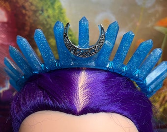 Blue resin crown, sparkling with lots of glitter, with blue wire and silver moon accent, comes with a metal headband