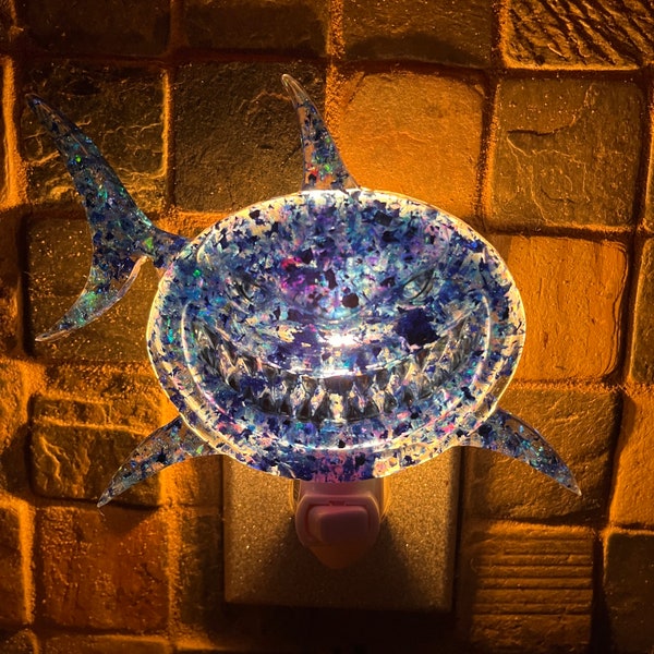 Blue Shark Nightlight, made with blues iridescent flakes, and silver teeth and eyes, handmade from resin, plugs into standard outlet