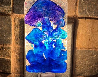 Mushroom Nightlight, blue and purple with iridescent flakes in background, handmade from resin, plugs into standard outlet