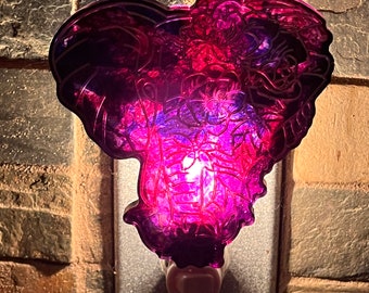 Elephant Nightlight, half flowers, shades of red with silver accents, handmade from resin, plugs into standard outlet