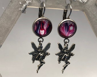 Earring set with acrylic paint cabochon and dangling fairy, shades of pinks and purple