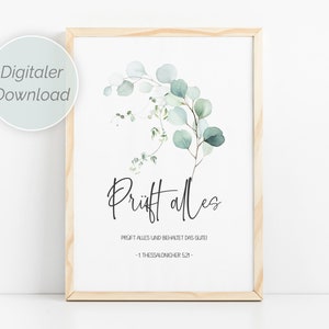 Könnte beinhalten: Ein druckbarer Wandkunstdruck mit einer Aquarell-Illustration von Eukalyptusblättern in Grüntönen. Der Text lautet "Prüft alles" und "Prüft alles und behaltet das Gute" - 1 Thessalonicher 5:21.