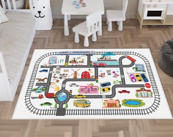 May include: A white play mat featuring a colorful town and train track design. The mat includes roads, buildings, a train, cars, and farm animals. The mat is designed for children's play and learning.