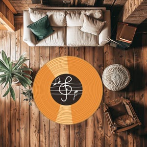 May include: Orange and black round rug with a treble clef and musical notes design. The rug is on a wooden floor.