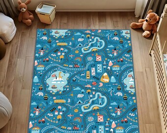 May include: A rectangular area rug featuring a blue background with a repeating pattern of winding roads, train tracks, colorful buildings, windmills, trees, animals, and vehicles including cars, trains, and boats in various bright colors.