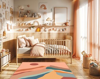 May include: A rectangular area rug featuring a stylized landscape design with layered hills in shades of terracotta, peach, teal, and cream, topped with a solid dark red circle representing the sun, set against a light wood floor in a nursery.