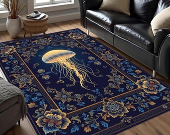 May include: A rectangular area rug featuring a deep navy blue background with a central golden jellyfish illustration. The rug is bordered by a decorative frame of intricate floral patterns in shades of gold, blue, and cream with geometric accents.
