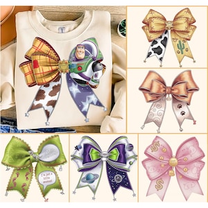 May include: Six different colourful bow designs featuring various cartoon characters and patterns. The bows are made of fabric and have a variety of embellishments, including stars, paw prints, and dollar signs. The bows are all tied with a ribbon and have a small charm hanging from the centre.