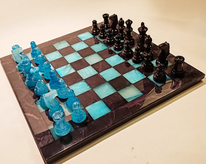 Featured listing image: 1970s Stunning Chess Set in Genuine Hand Carved Alabaster of Volterra - Black and Sky Blue - Made in Italy